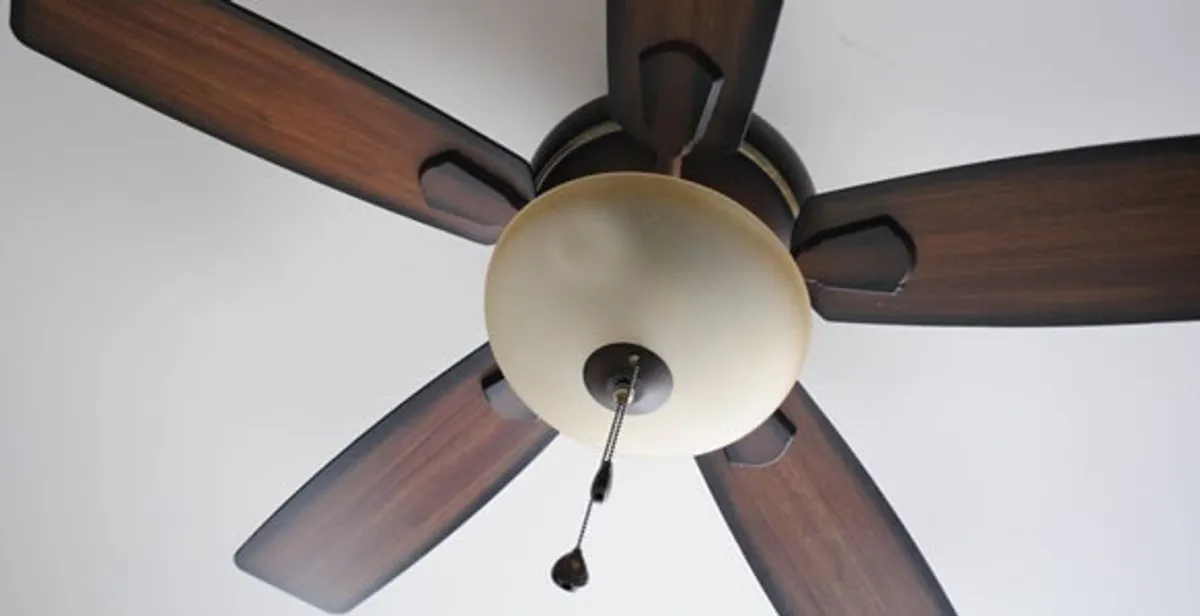 Fully installed ceiling fan with balanced blades and light fixture in Des Moines, IA